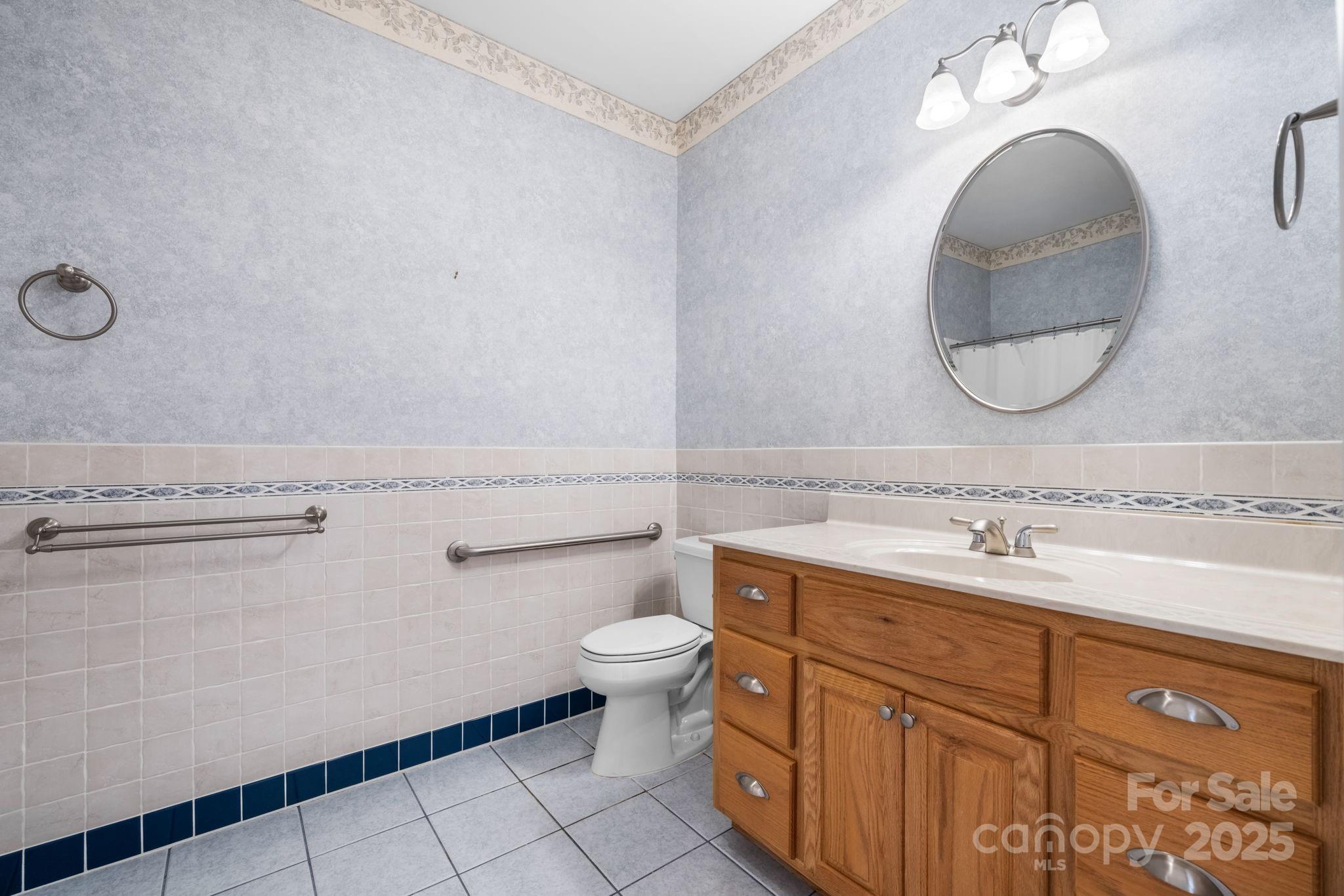 906 3rd St Drive Northeast Conover, NC 28613 - Photo 19 of 47 a bathroom with a sink and a mirror