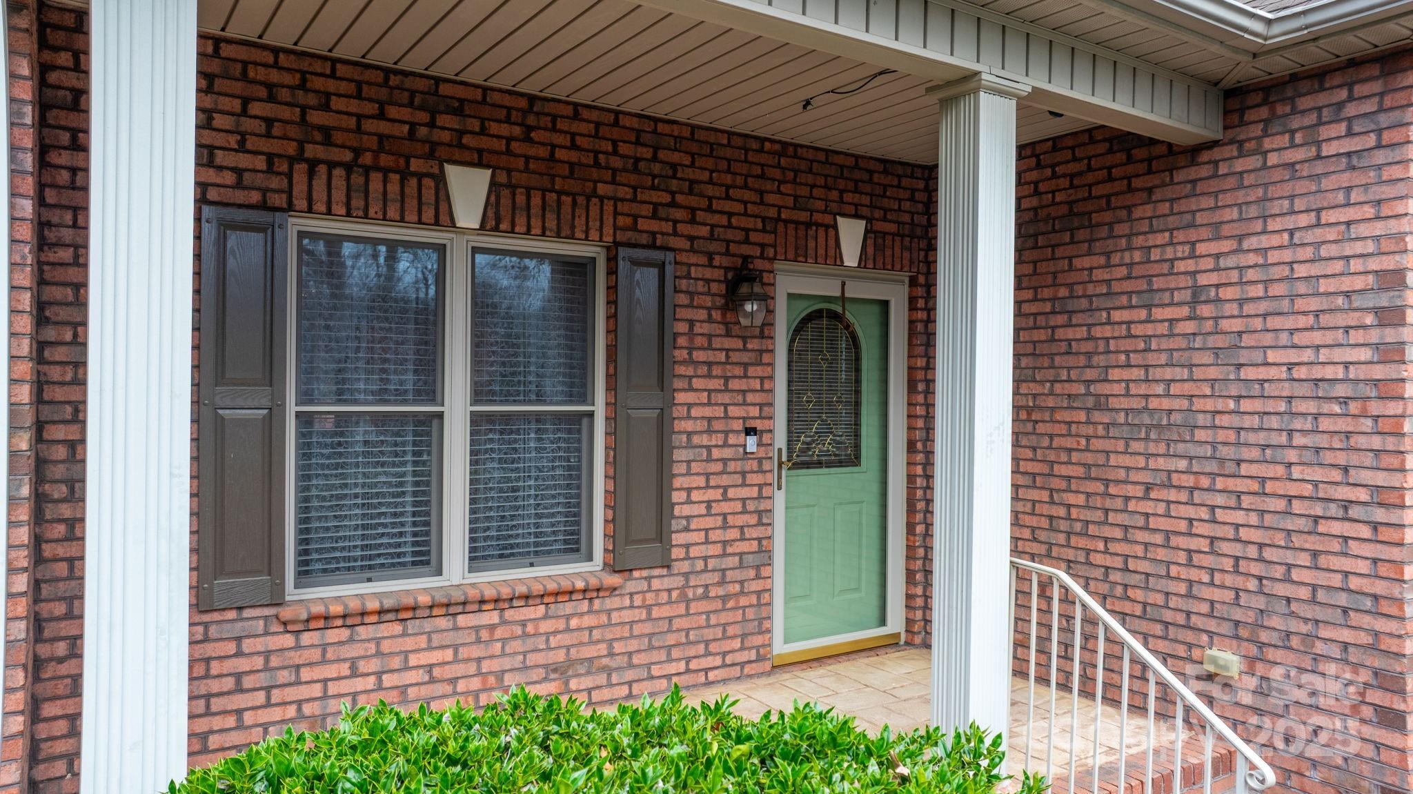 906 3rd St Drive Northeast Conover, NC 28613 - Photo 30 of 47 a front view of a house with a garage