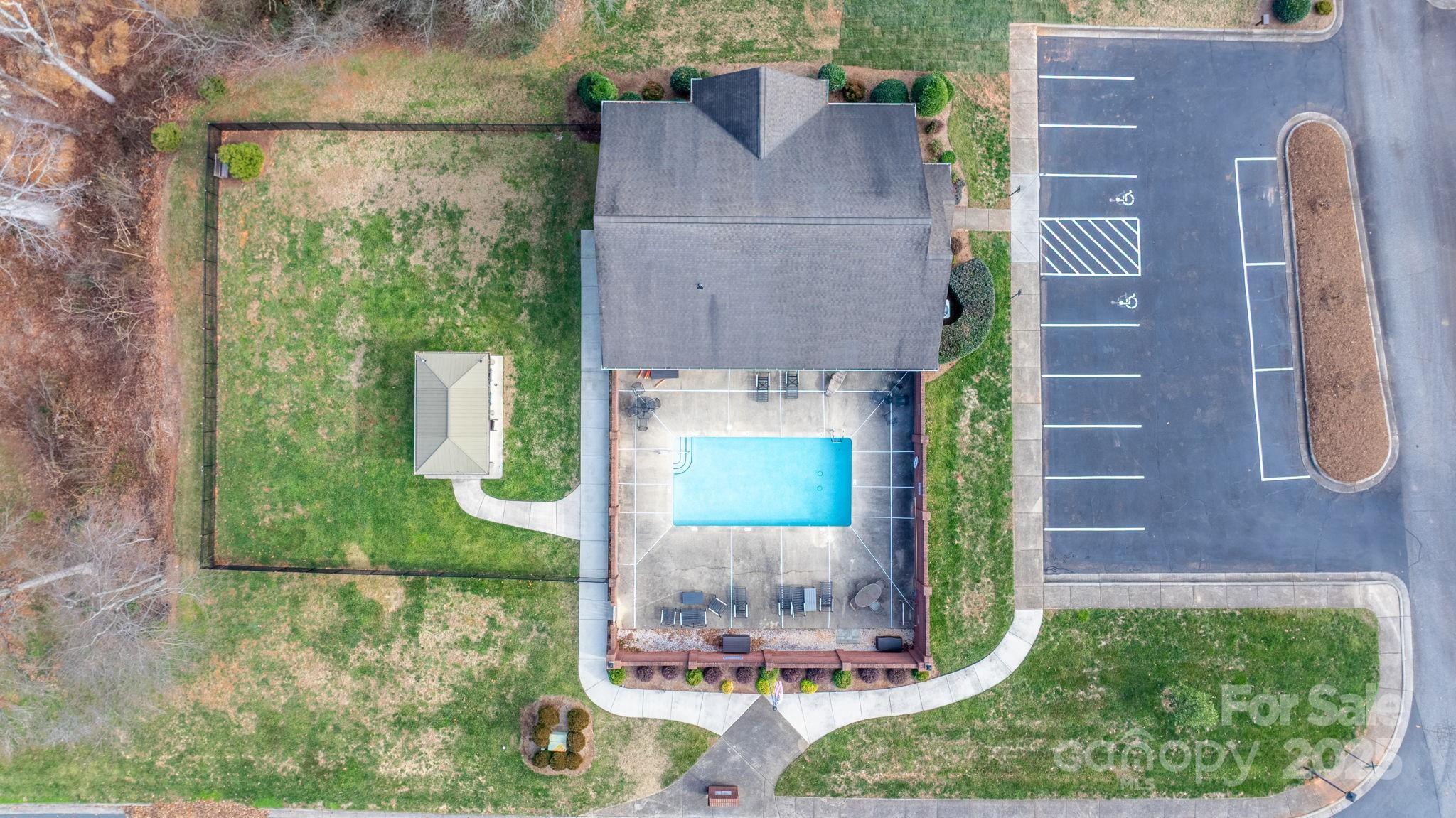 906 3rd St Drive Northeast Conover, NC 28613 - Photo 3 of 47 an aerial view of a house with a swimming pool