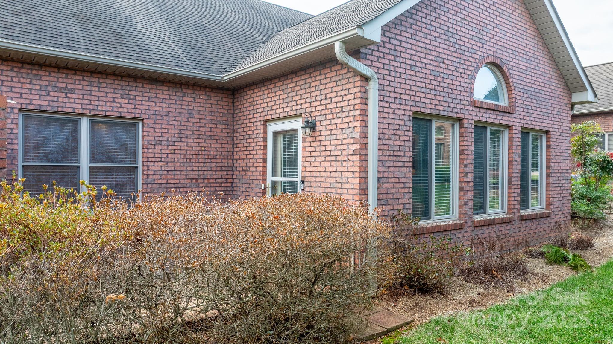 906 3rd St Drive Northeast Conover, NC 28613 - Photo 31 of 47 a front view of a house with large windows