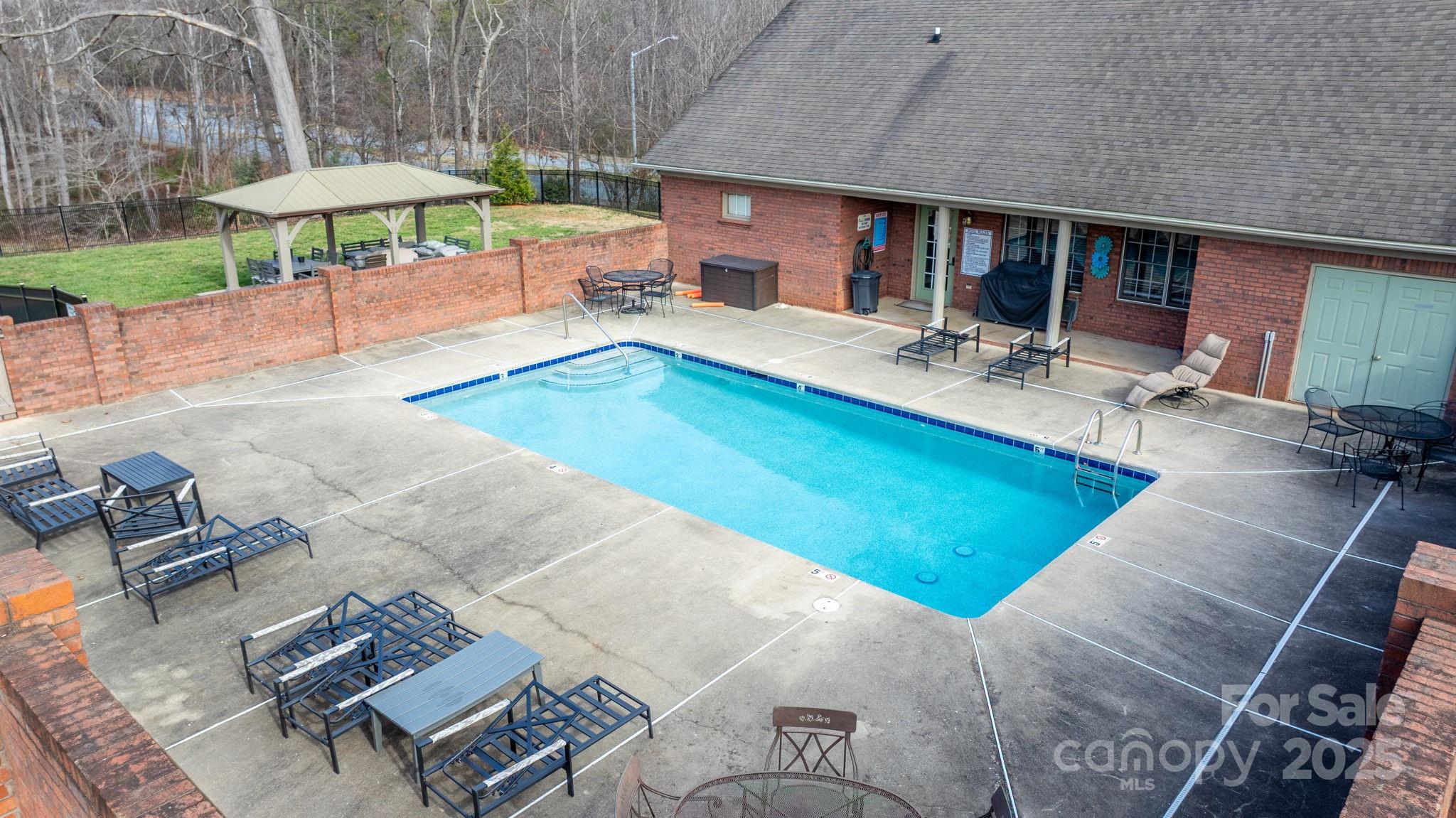 906 3rd St Drive Northeast Conover, NC 28613 - Photo 38 of 47 a view of a chairs and table in the patio