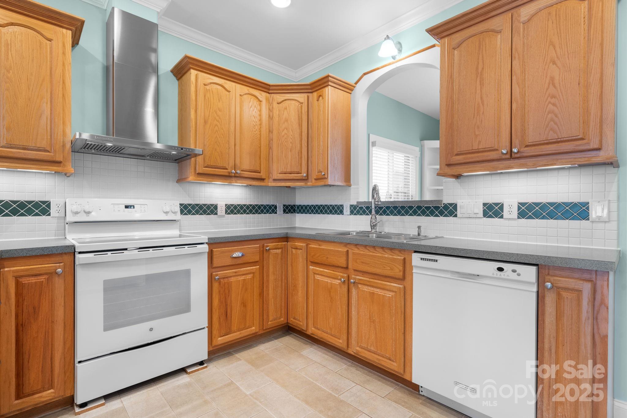 906 3rd St Drive Northeast Conover, NC 28613 - Photo 8 of 47 a kitchen with stainless steel appliances granite countertop a sink and cabinets
