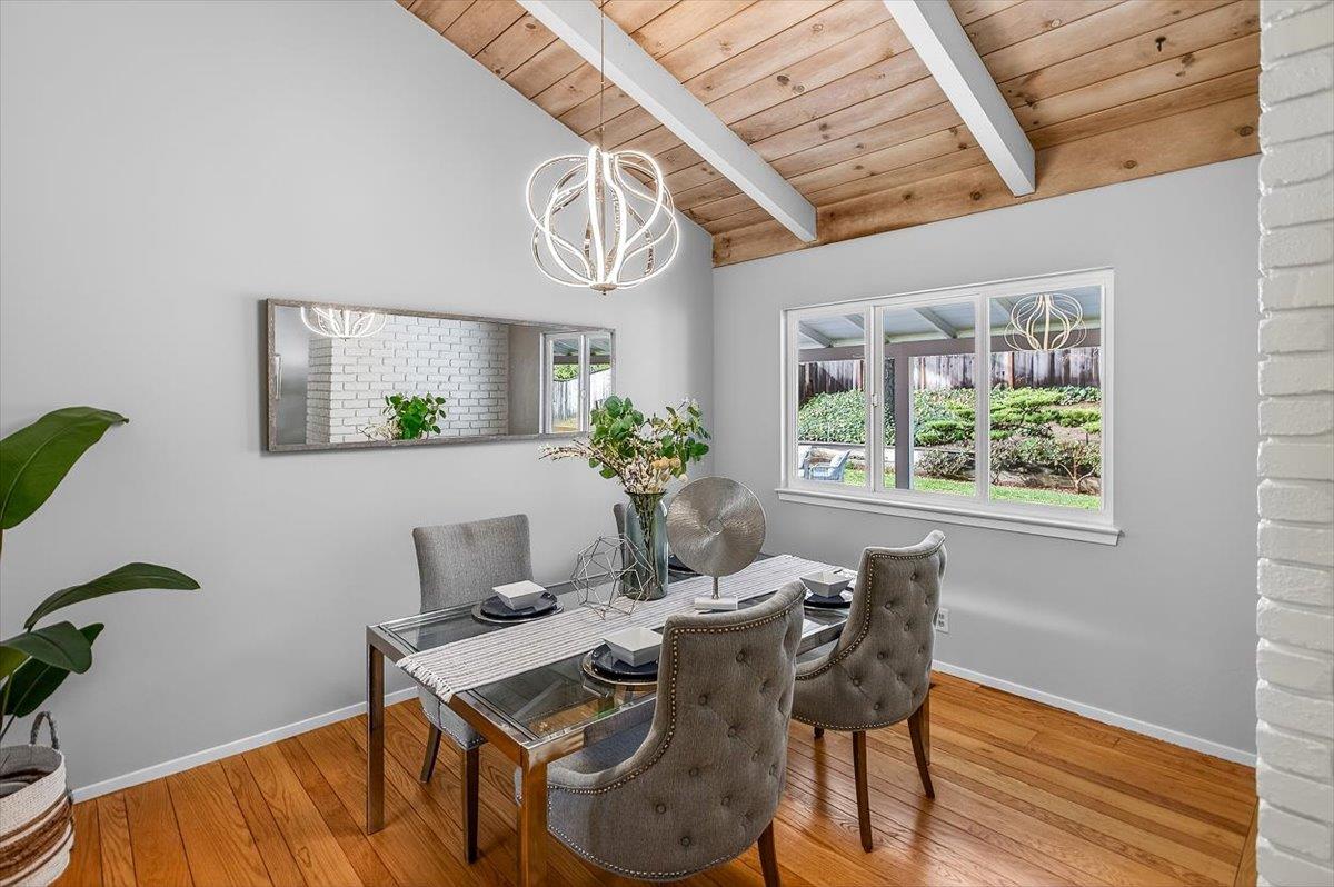 251 Old Adobe Road Los Gatos, CA 95032 - Photo 19 of 40 a view of a dining room with furniture window and wooden floor