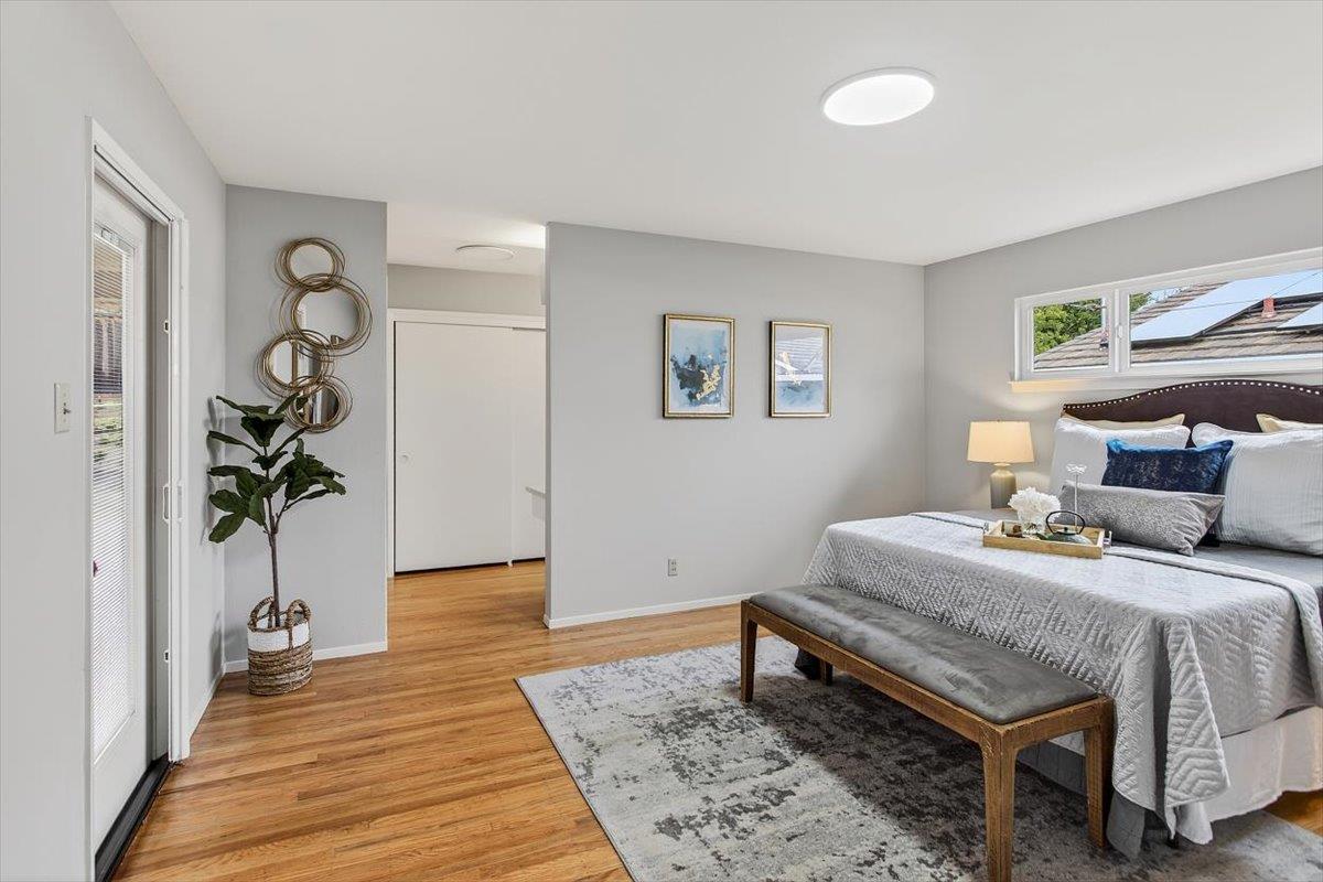 251 Old Adobe Road Los Gatos, CA 95032 - Photo 20 of 40 a bedroom with a bed and a potted plant