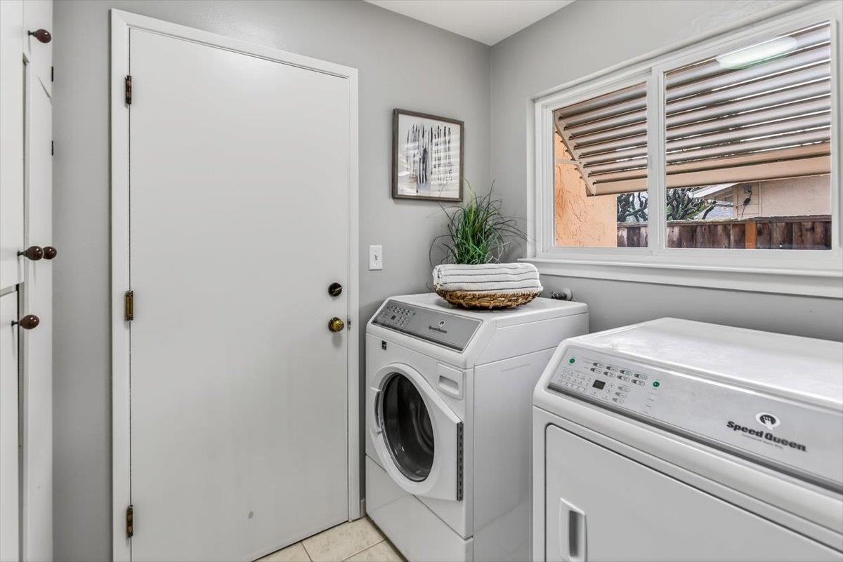 251 Old Adobe Road Los Gatos, CA 95032 - Photo 29 of 40 a view of washer and dryer with bathroom in the background