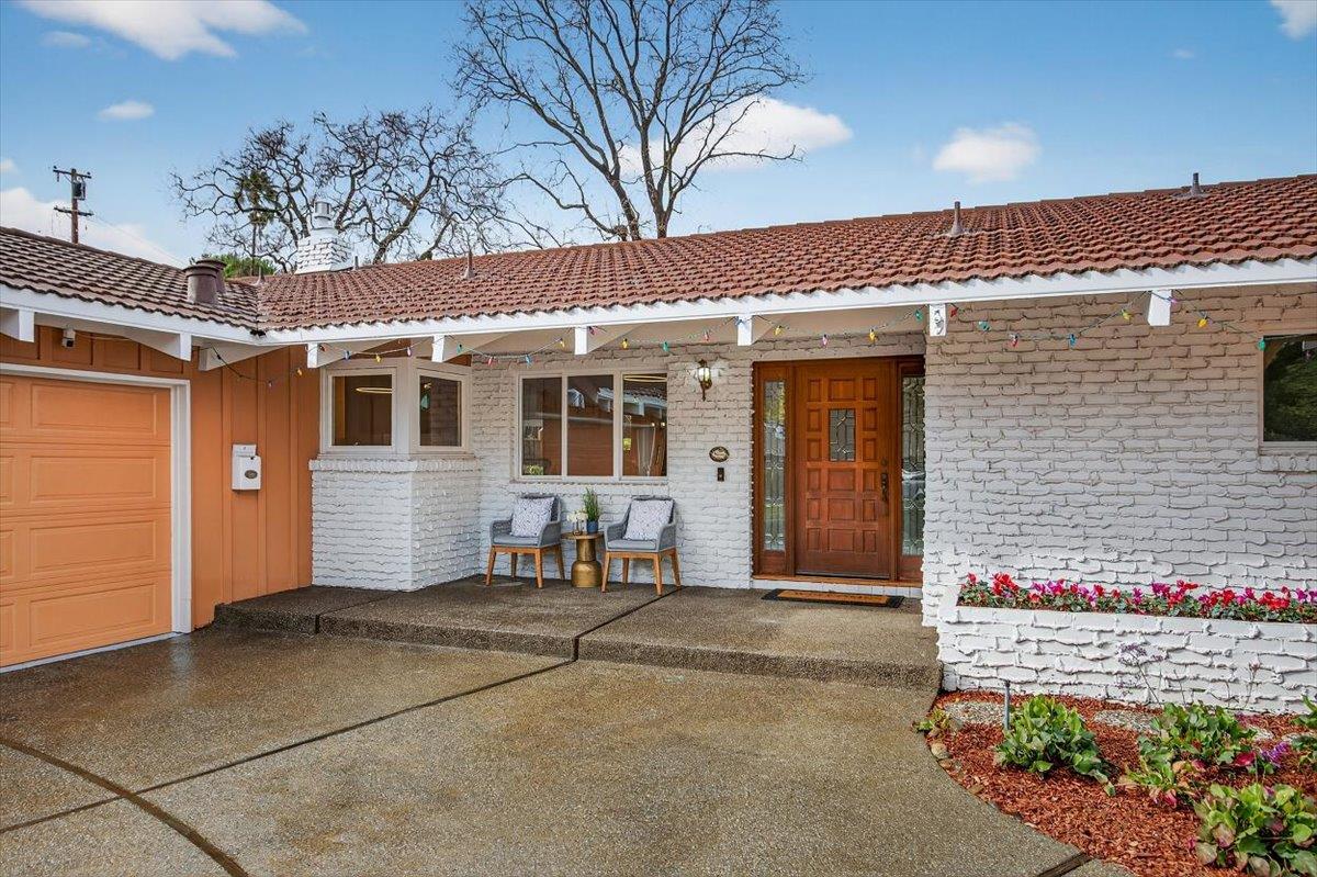 251 Old Adobe Road Los Gatos, CA 95032 - Photo 5 of 40 a front view of a house with a porch