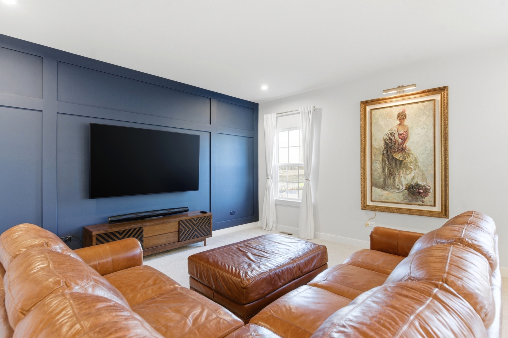 306 Atkinson Drive Sugar Grove, IL 60554 - Photo 14 of 50 a living room with couches and a flat screen tv