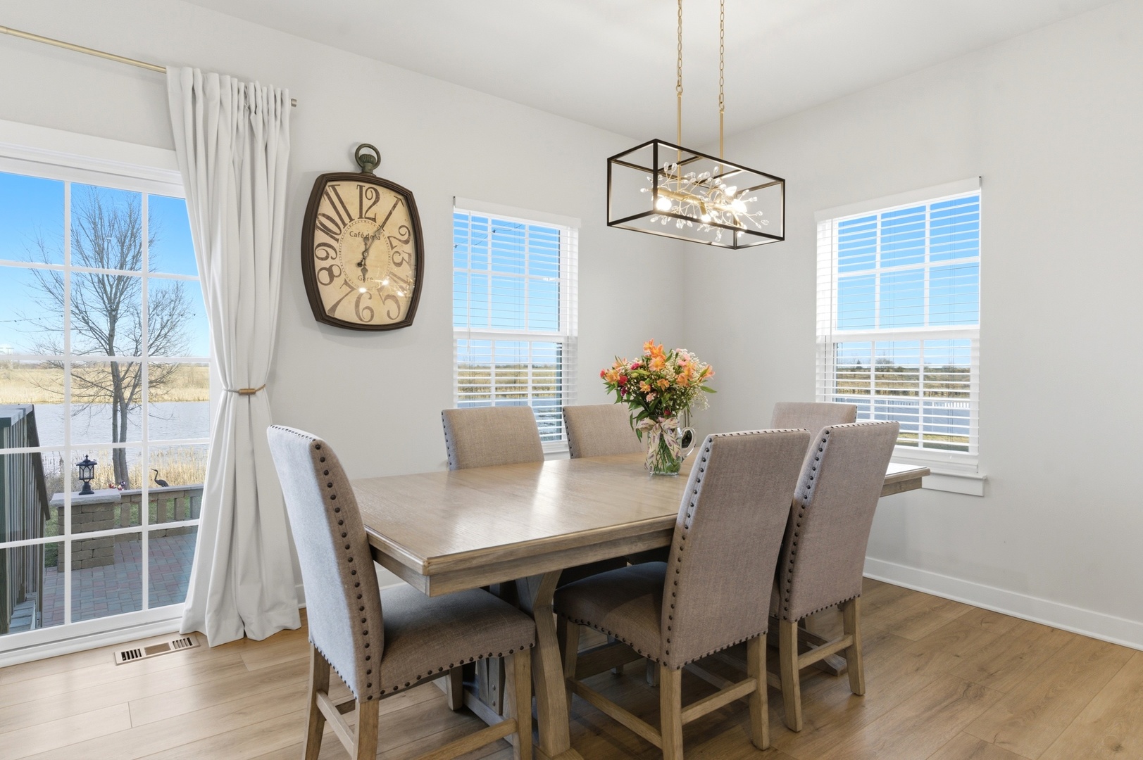 306 Atkinson Drive Sugar Grove, IL 60554 - Photo 17 of 50 a view of a dining room with furniture window and wooden floor