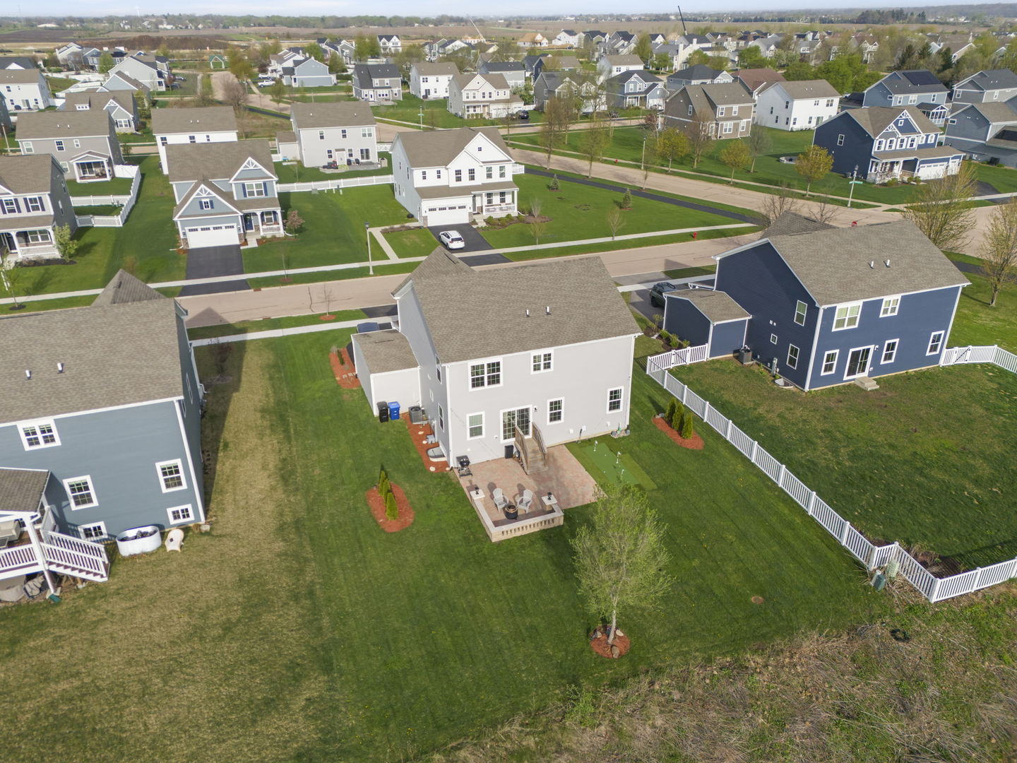 306 Atkinson Drive Sugar Grove, IL 60554 - Photo 2 of 50 an aerial view of residential houses with outdoor space and parking