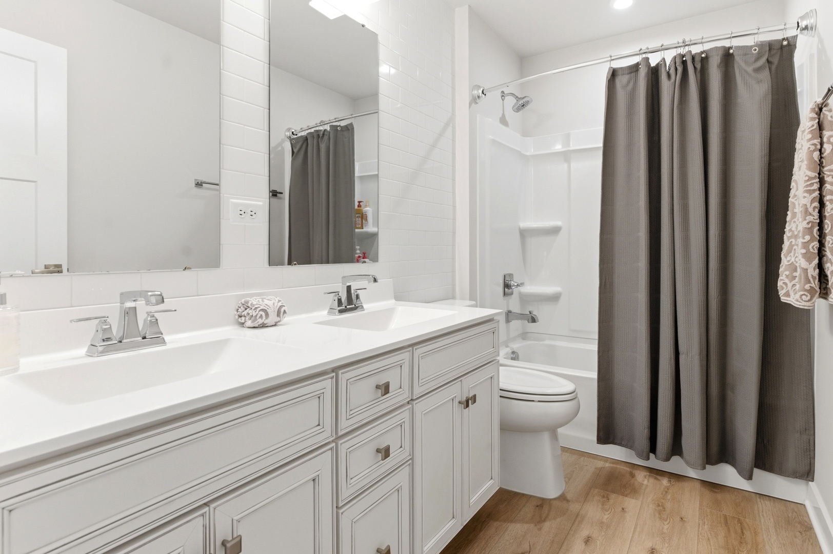 306 Atkinson Drive Sugar Grove, IL 60554 - Photo 28 of 50 a bathroom with a double vanity sink mirror and toilet