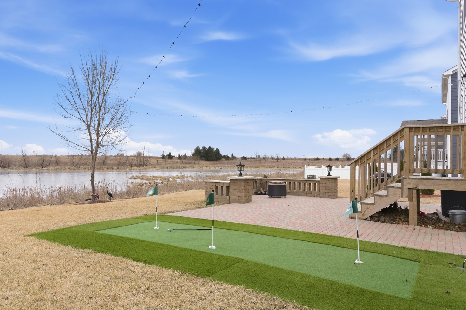306 Atkinson Drive Sugar Grove, IL 60554 - Photo 39 of 50 a view of a lake with couches and city view