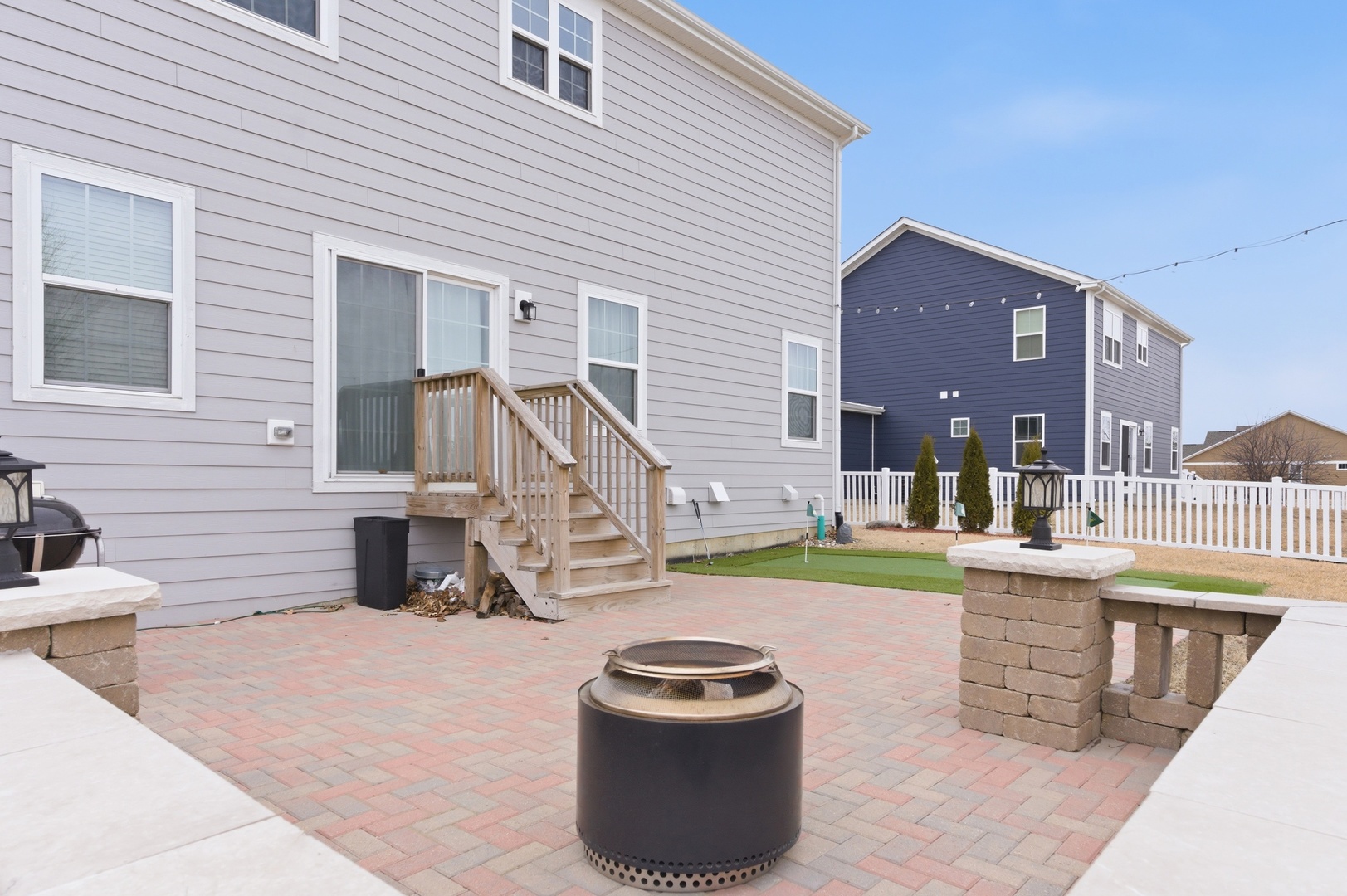306 Atkinson Drive Sugar Grove, IL 60554 - Photo 41 of 50 a view of a house with backyard sitting area and swimming pool