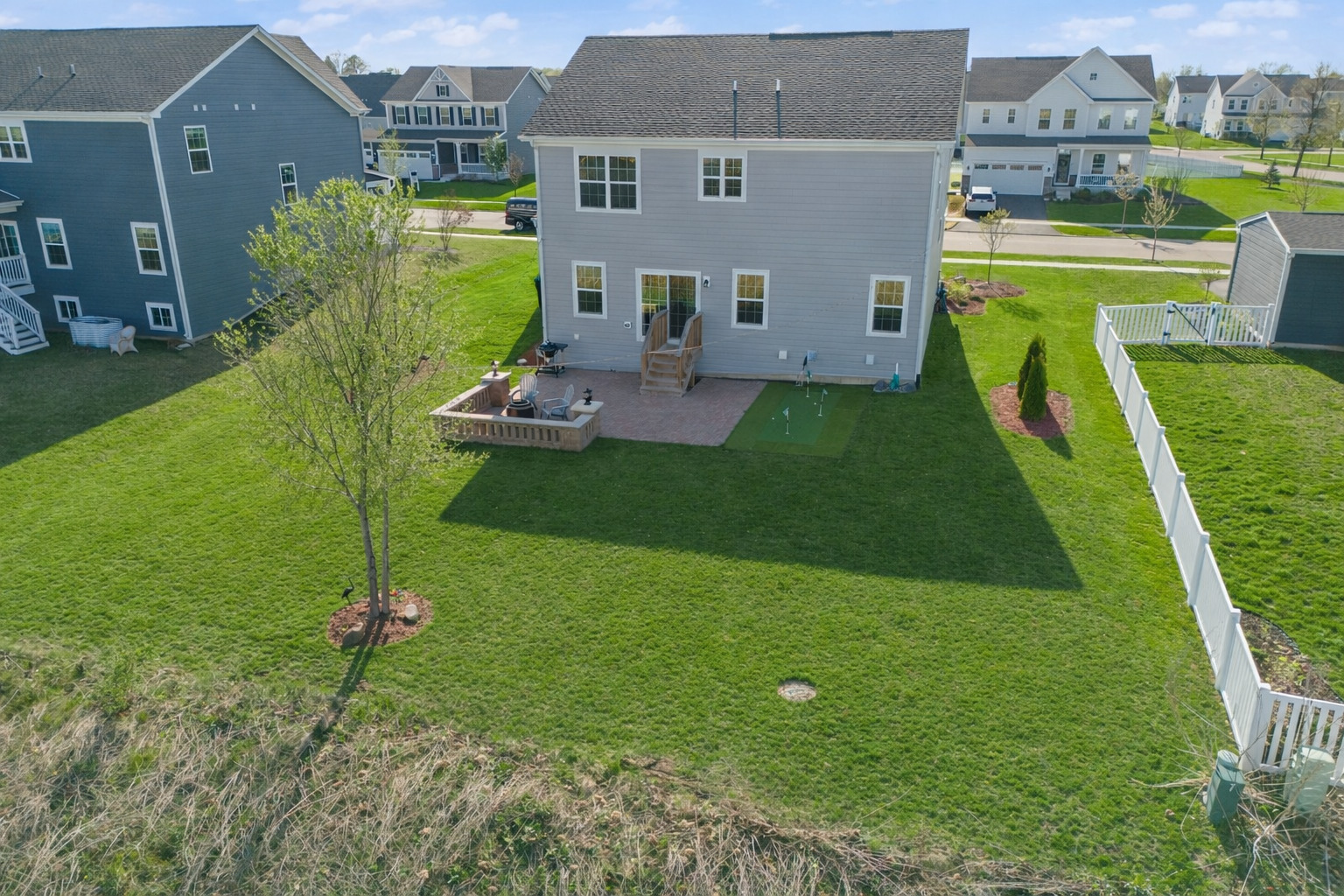 306 Atkinson Drive Sugar Grove, IL 60554 - Photo 42 of 50 a view of a house with a backyard