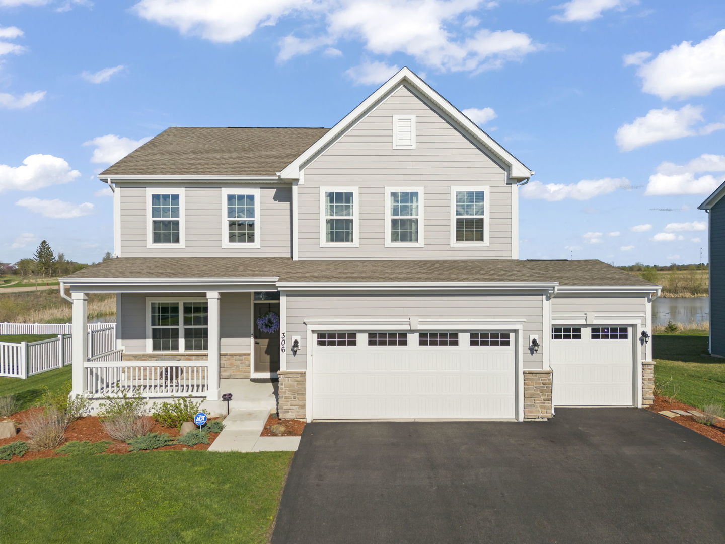 306 Atkinson Drive Sugar Grove, IL 60554 - Photo 5 of 50 a view of house with yard and entertaining space