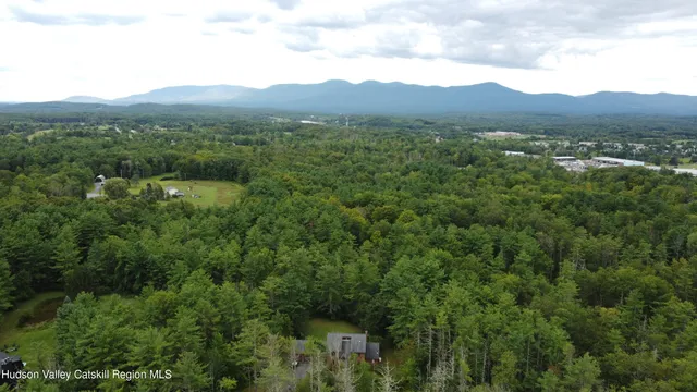 a view of balcony with wooden floor and outdoor space