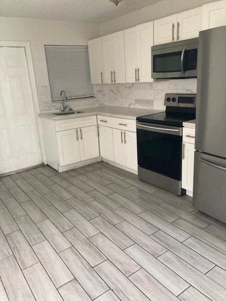 1565 West 36th Street Riviera Beach, FL 33404 - Photo 6 of 8 1565 KITCHEN