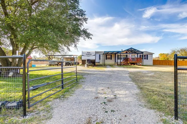 a view of swimming pool with seating area