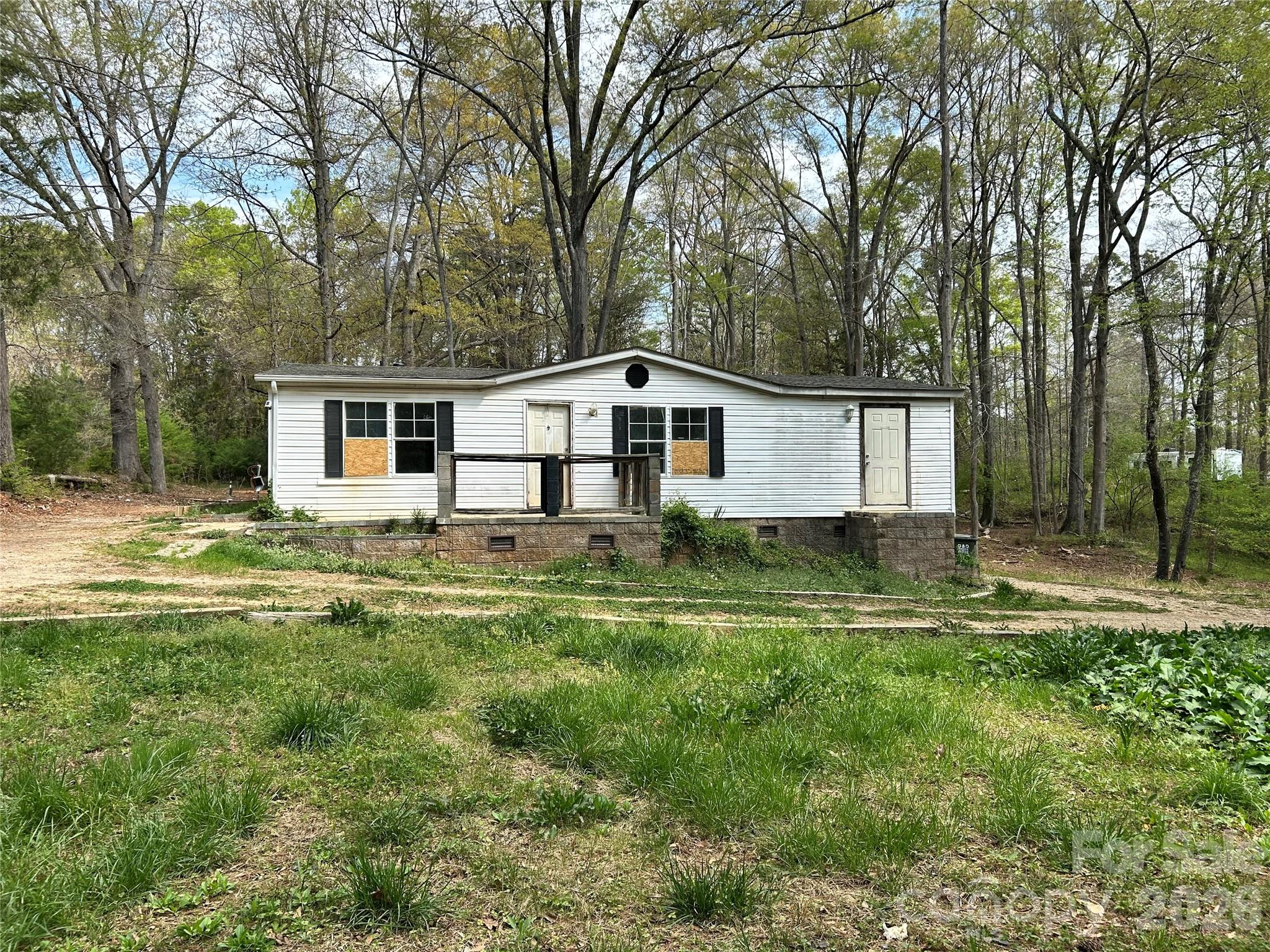 2137 Plumcrest Lane Clover, SC 29710 - Photo 1 of 23 a view of a house with a yard