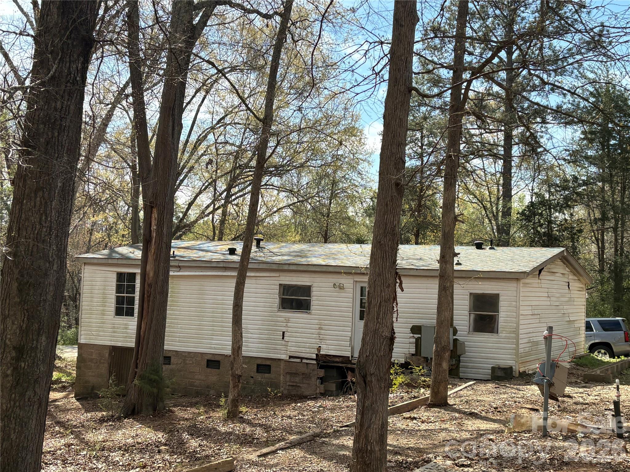 2137 Plumcrest Lane Clover, SC 29710 - Photo 22 of 23 a front view of a house with garden