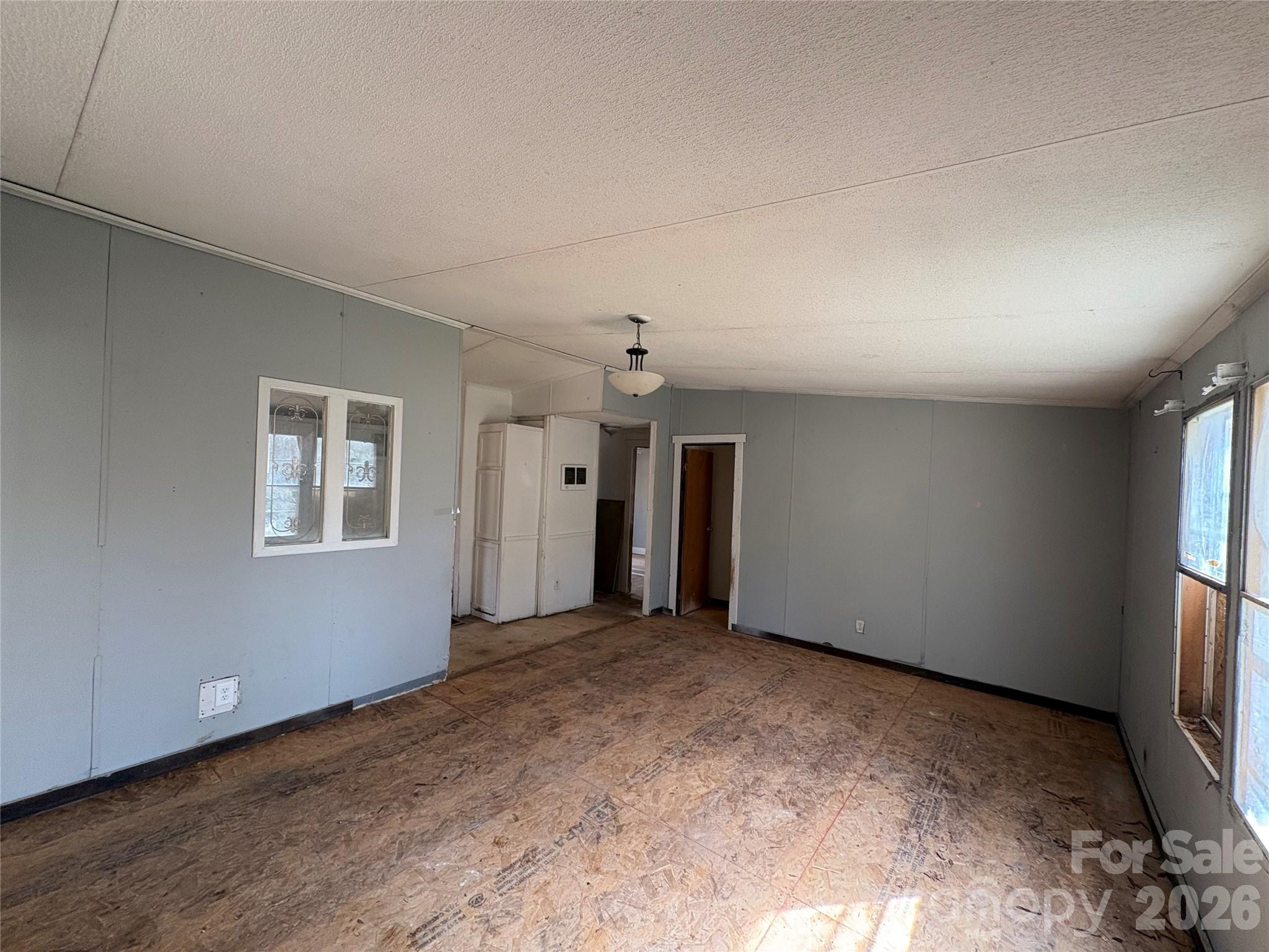 2137 Plumcrest Lane Clover, SC 29710 - Photo 5 of 23 a view of a livingroom with a ceiling fan and window