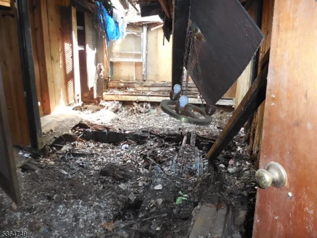 a view of a backyard of the house