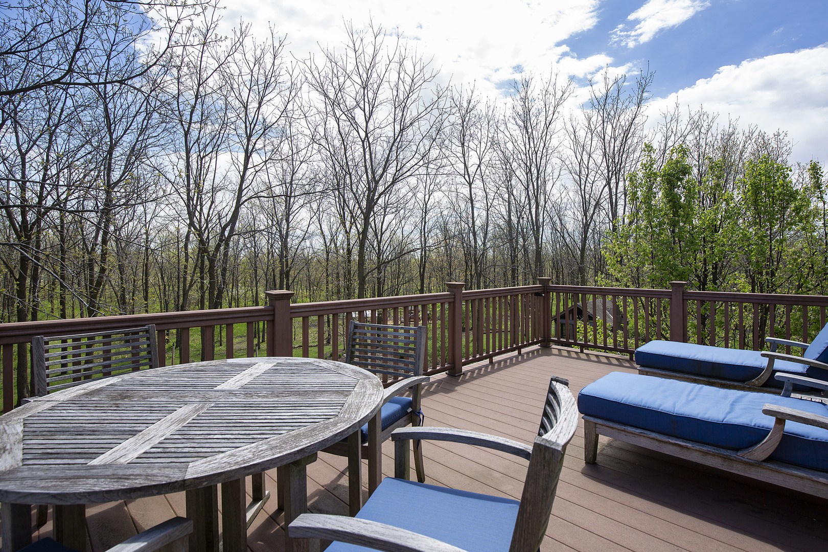 10309 Lawrence Road Harvard, IL 60033 - Photo 31 of 56 a view of a deck with a table and chairs with wooden floor