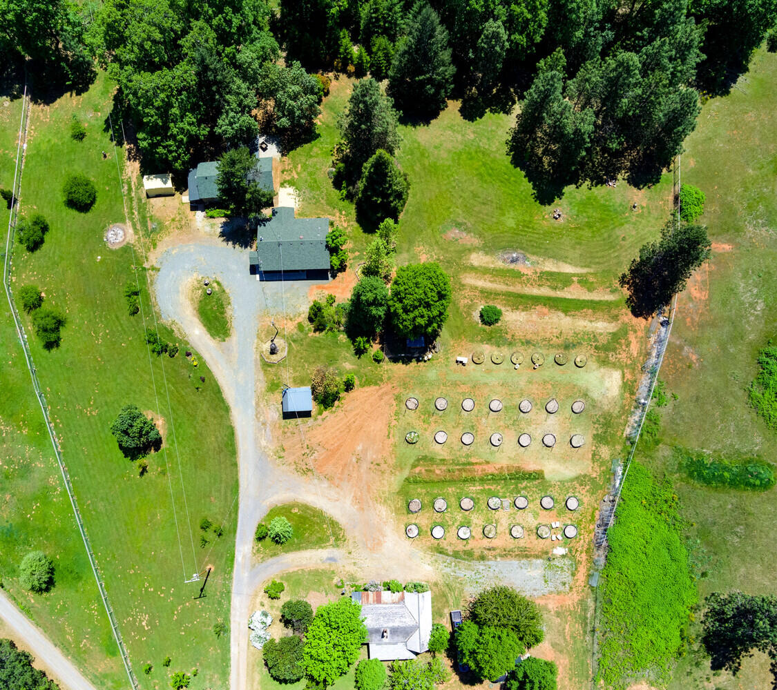 5916 Tunnel Loop Road Grants Pass, OR 97526 - Photo 59 of 65 an aerial view of a residential house with an outdoor space and street view
