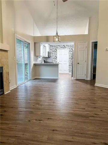 a view of a hallway with a room