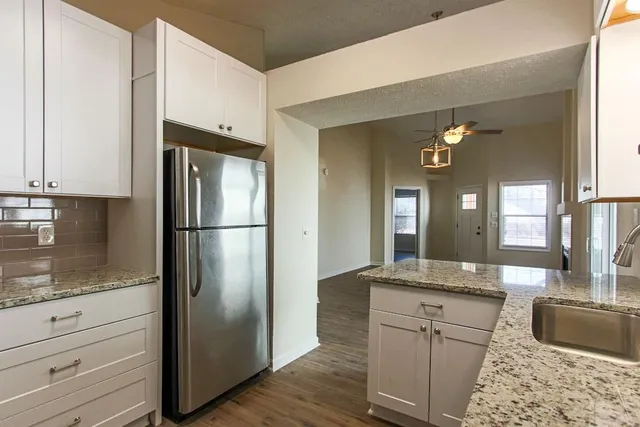 a bathroom with a sink and a granite