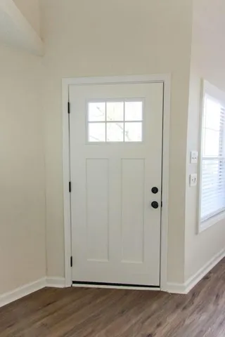 a view of a backyard of the house