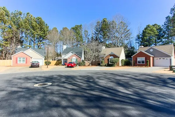 a view of street with houses