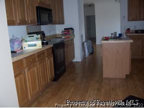 Hadley Mill Road Pinehurst, NC 28374 - Photo 3 of 3 a kitchen with a sink and cabinets
