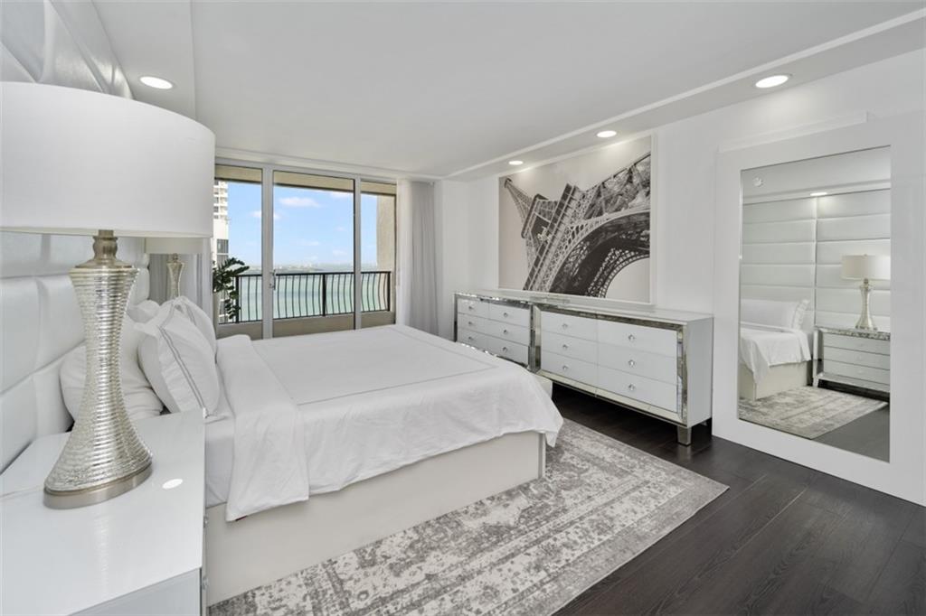 555 Northeast 15th Street, Unit 32C Miami, FL 33132 - Photo 12 of 21 a bedroom with a bed and a window