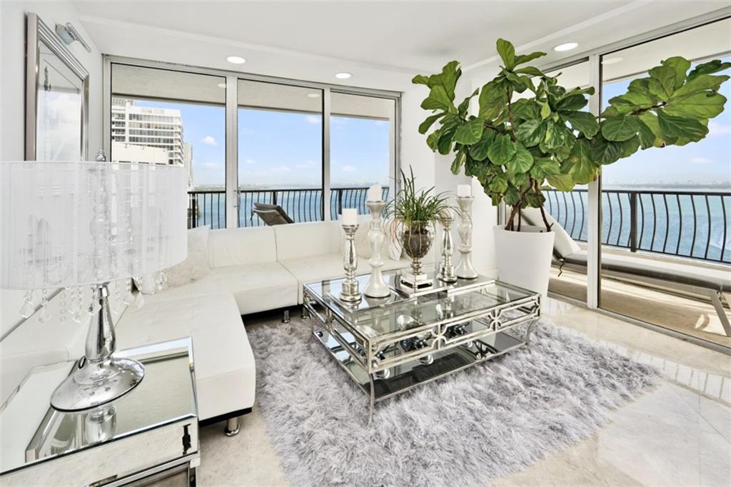 555 Northeast 15th Street, Unit 32C Miami, FL 33132 - Photo 6 of 21 a living room with furniture