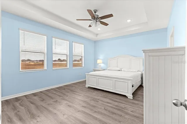 a spacious bathroom with a double vanity sink and a mirror