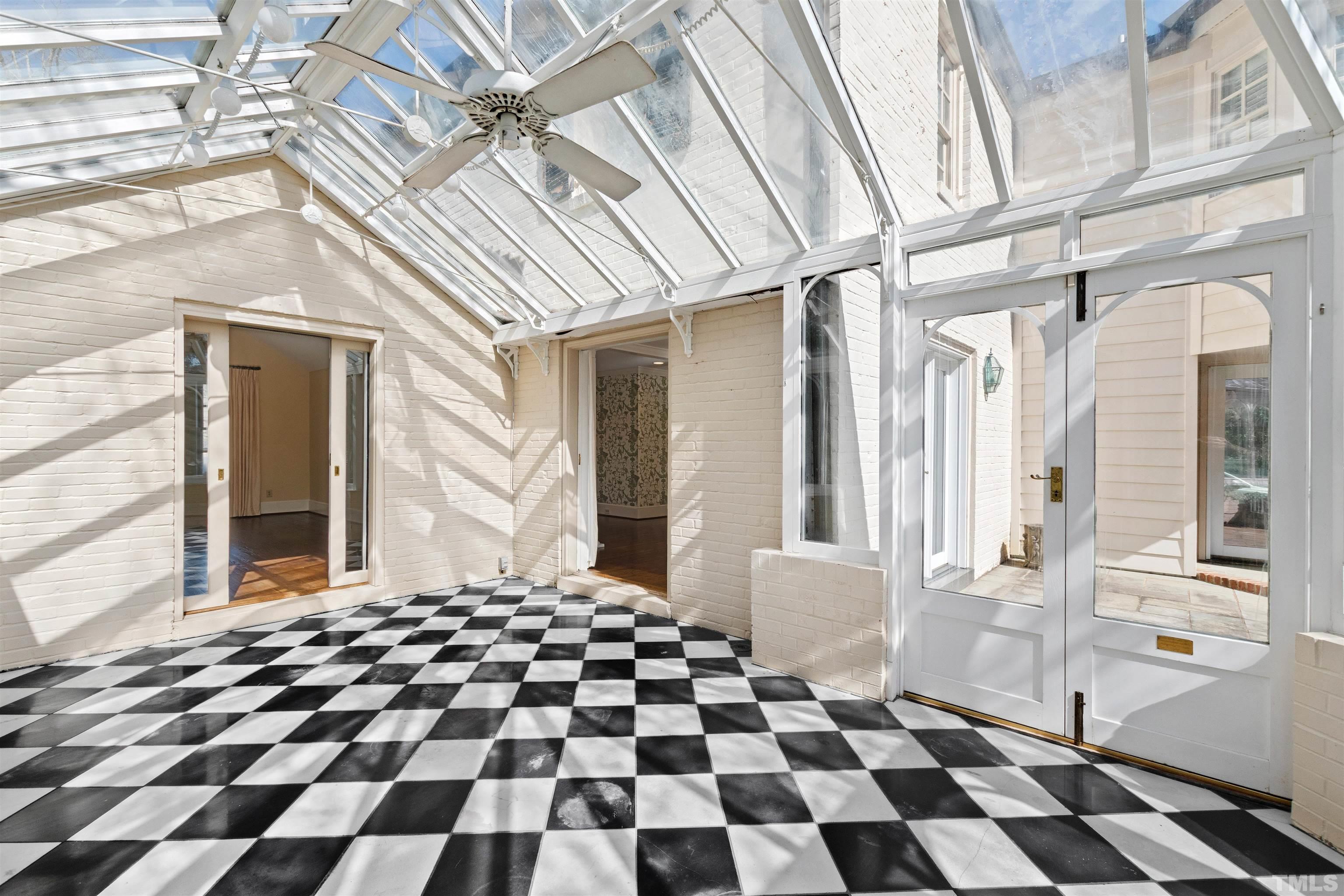 1718 Canterbury Road Raleigh, NC 27608 - Photo 11 of 30 a black and white checkered floor