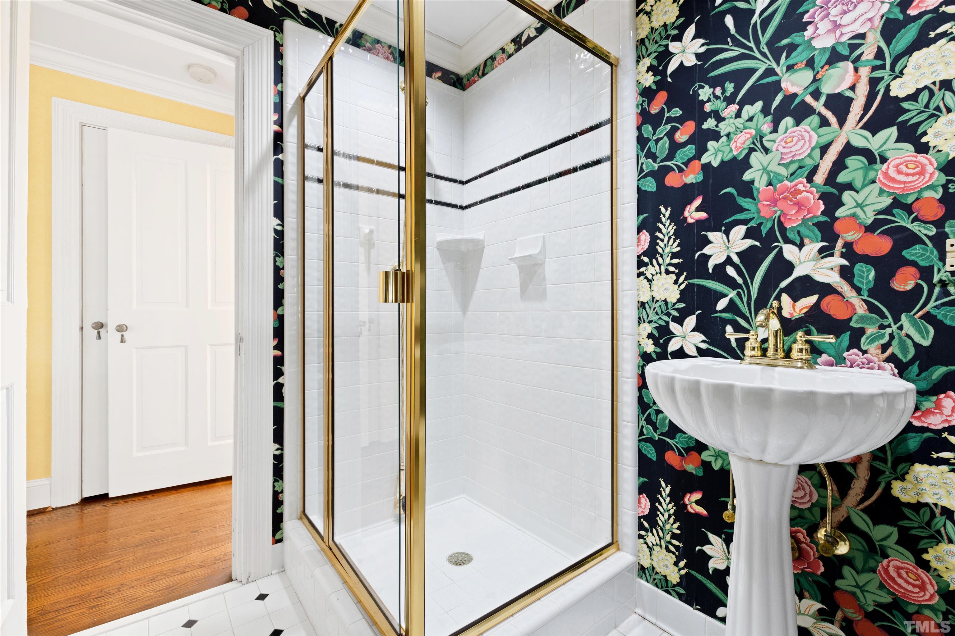 1718 Canterbury Road Raleigh, NC 27608 - Photo 18 of 30 a bathroom with a sink and a mirror