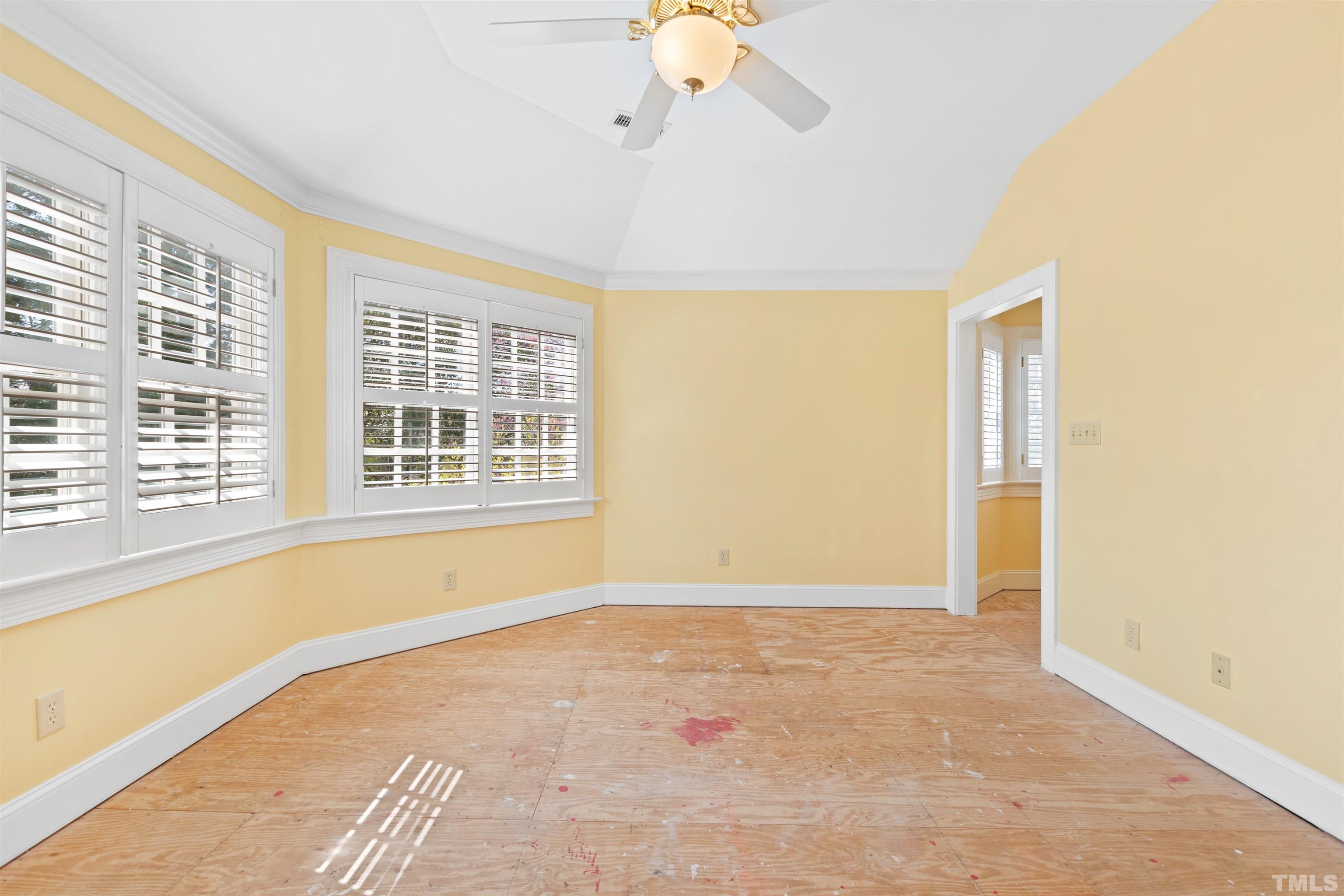 1718 Canterbury Road Raleigh, NC 27608 - Photo 24 of 30 a view of an empty room with a window
