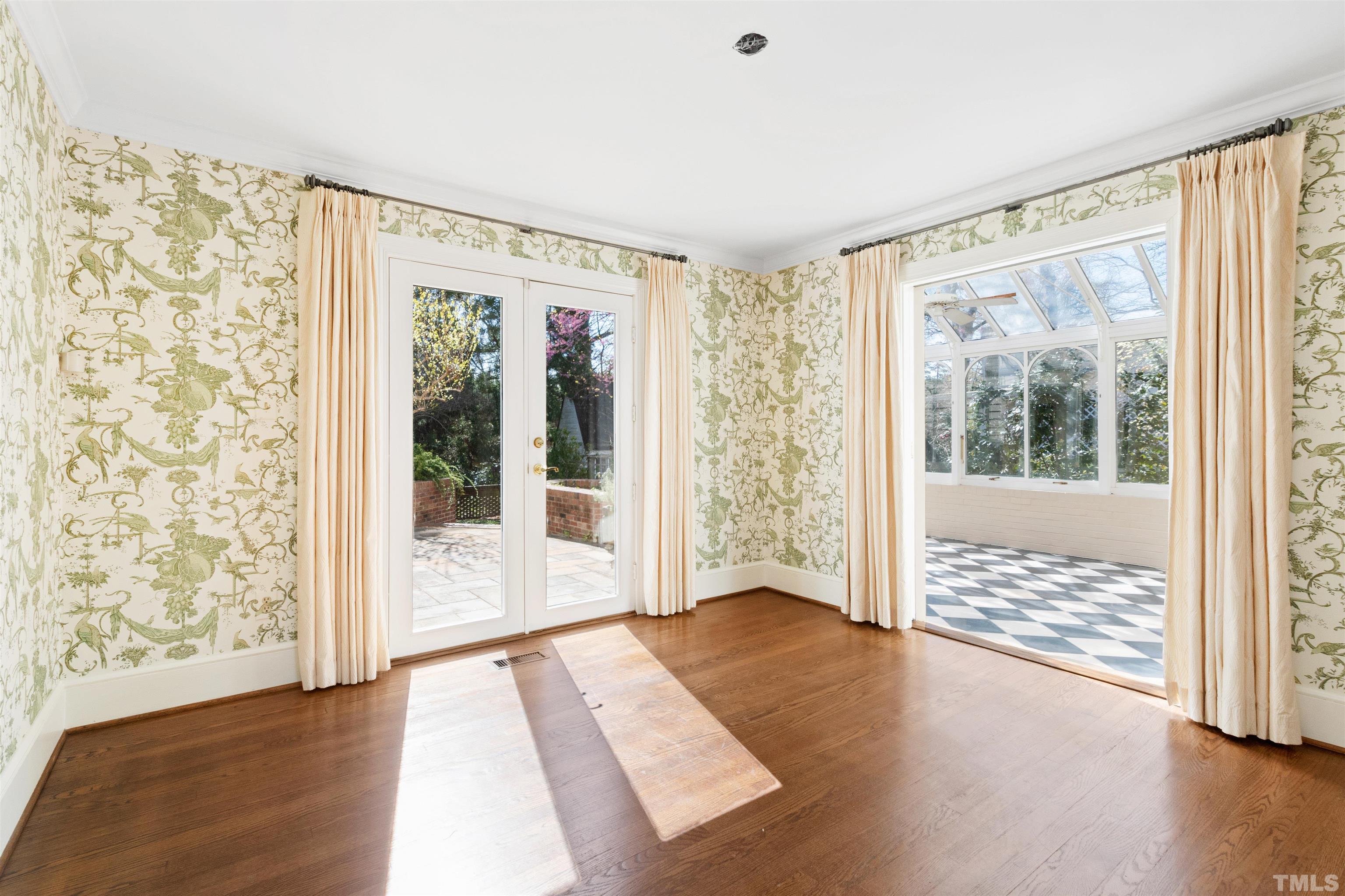 1718 Canterbury Road Raleigh, NC 27608 - Photo 7 of 30 a view of front door with wooden floor