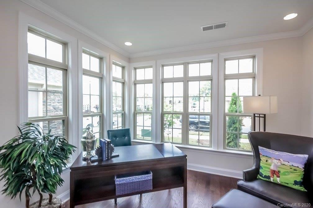 2018 New Style Way, Unit 5 Tega Cay, SC 29708 - Photo 19 of 36 a living room with furniture and a potted plant