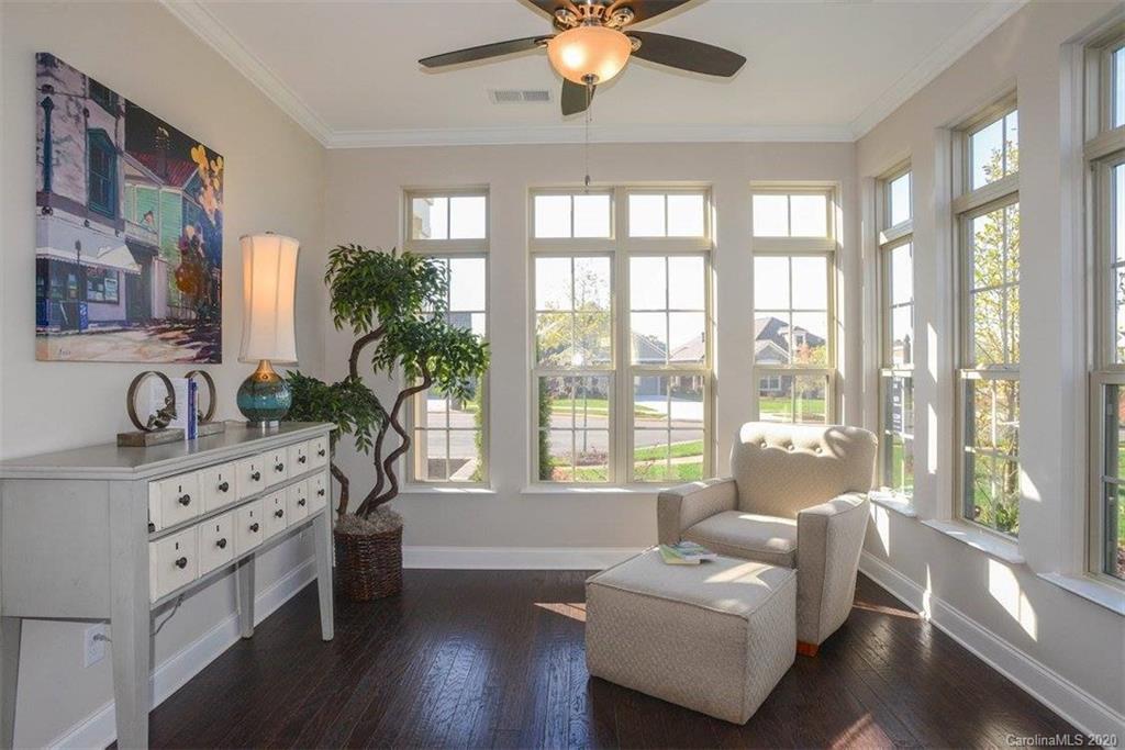 2018 New Style Way, Unit 5 Tega Cay, SC 29708 - Photo 20 of 36 a living room with furniture and a large window