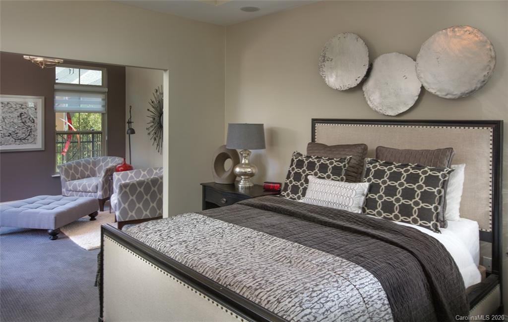 2018 New Style Way, Unit 5 Tega Cay, SC 29708 - Photo 3 of 36 a bedroom with a bed and wooden floor