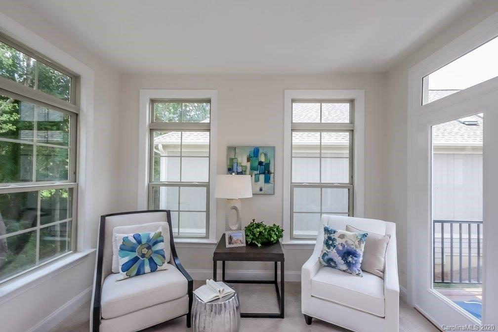 2018 New Style Way, Unit 5 Tega Cay, SC 29708 - Photo 35 of 36 a living room with furniture and windows