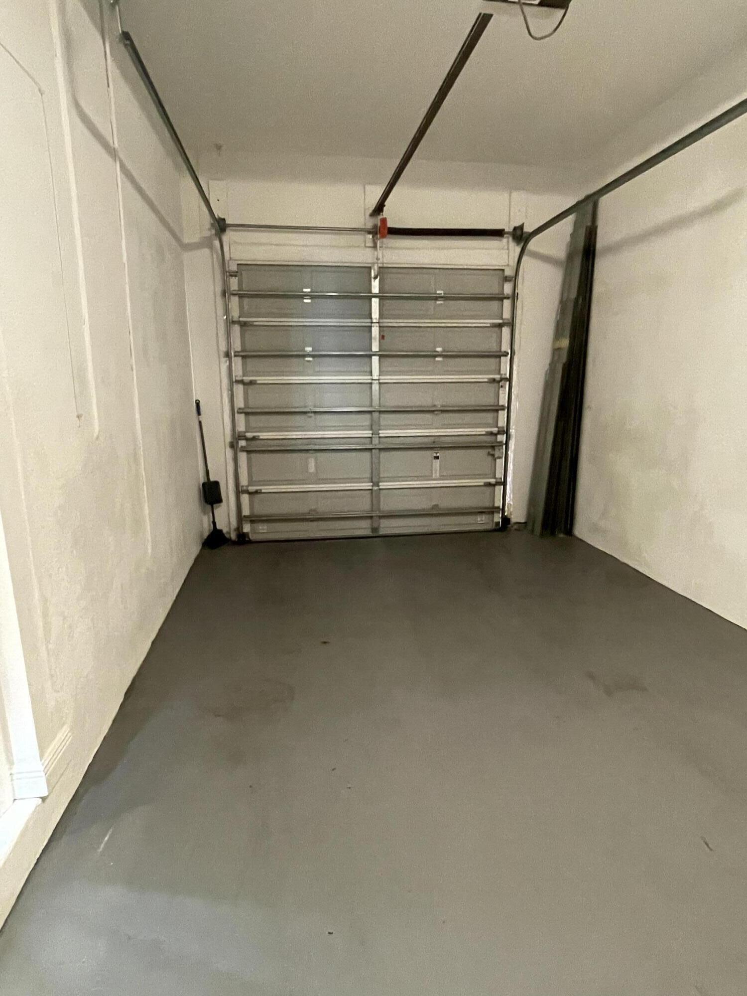 16075 Sims Road, Unit 203 Delray Beach, FL 33484 - Photo 15 of 20 a view of walk in closet with empty racks