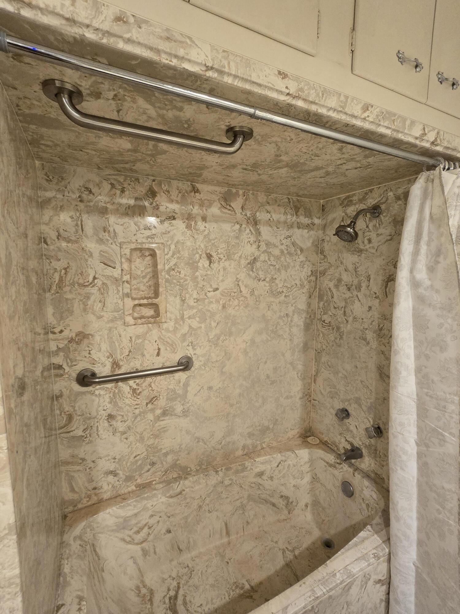 2229 South 6th Street Lamesa, TX 79331 - Photo 19 of 27 a bathroom with a shower