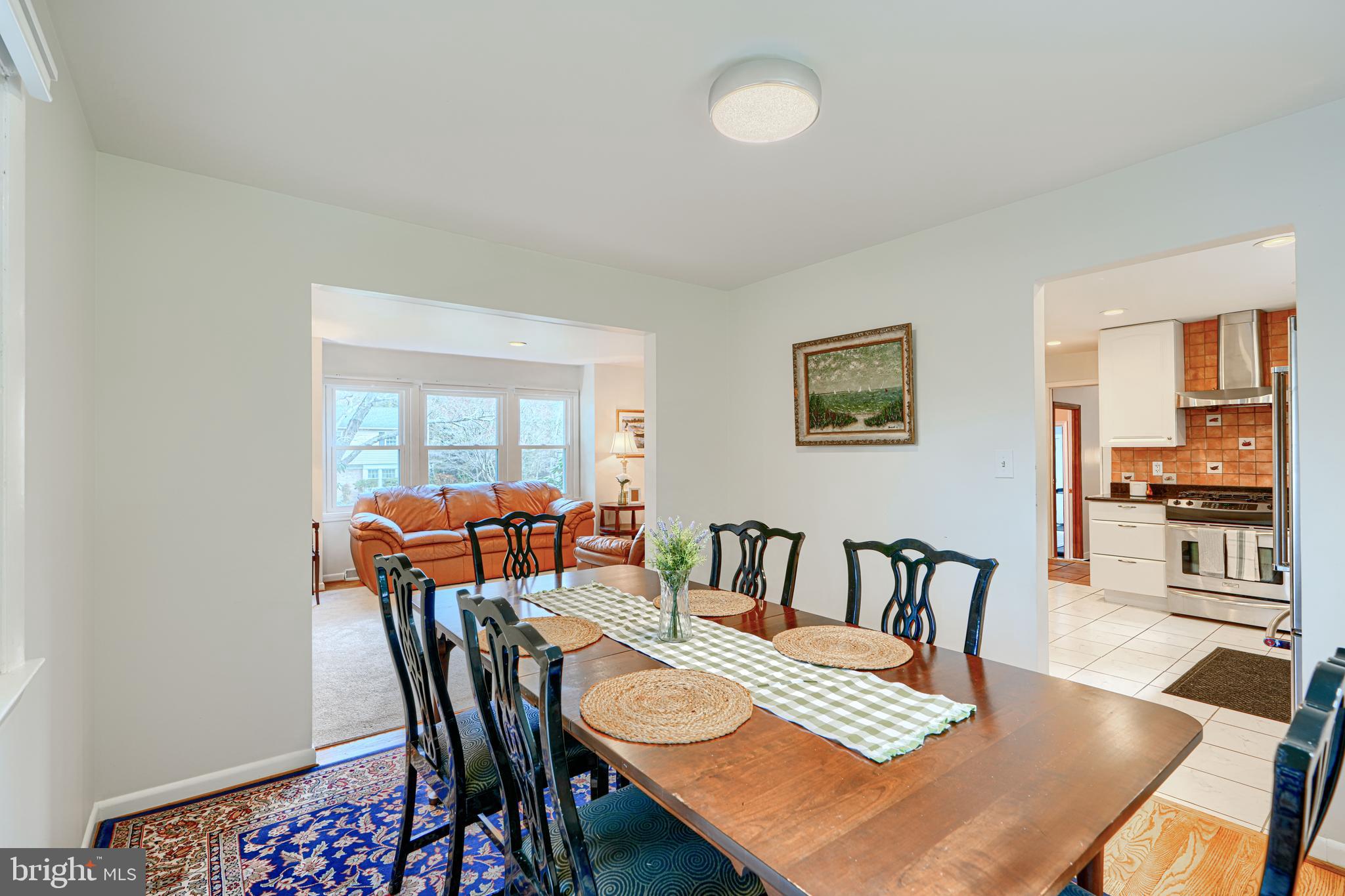 1202 Vermont Road Bel Air, MD 21014 - Photo 12 of 66 a view of a dining room with furniture and wooden floor