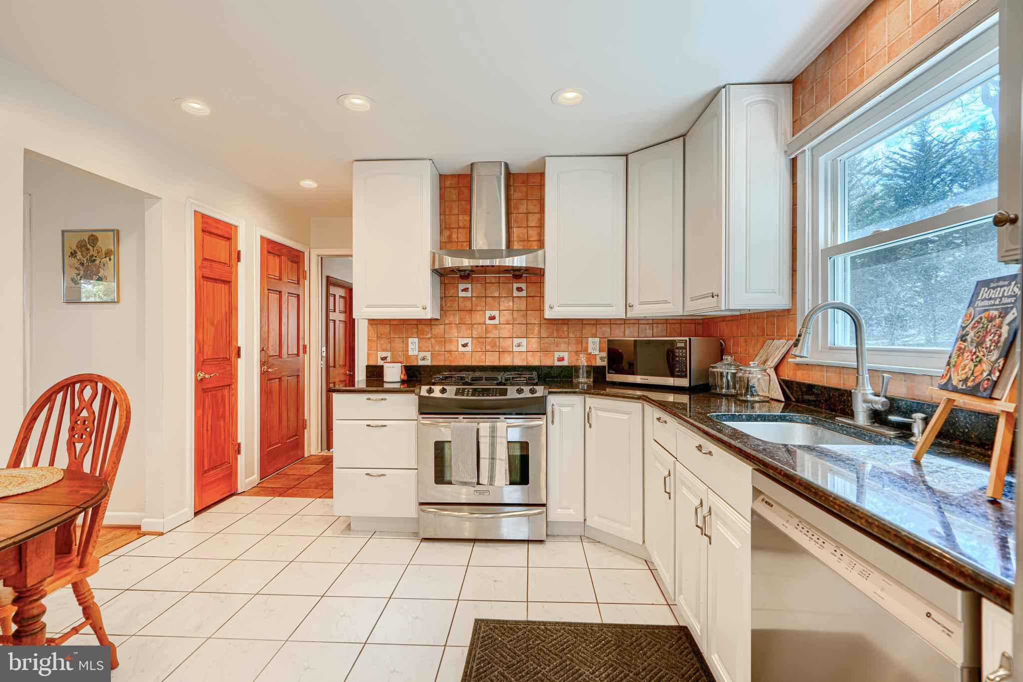 1202 Vermont Road Bel Air, MD 21014 - Photo 14 of 66 a kitchen with stainless steel appliances granite countertop a stove a sink and a refrigerator