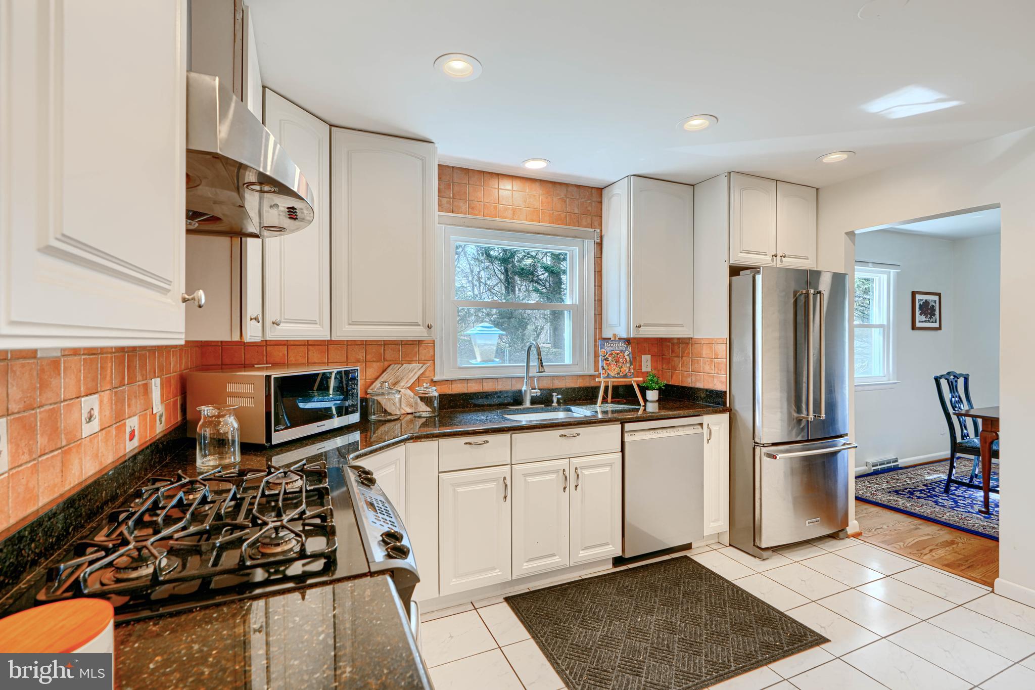 1202 Vermont Road Bel Air, MD 21014 - Photo 16 of 66 a kitchen with stainless steel appliances granite countertop a refrigerator and a stove top oven
