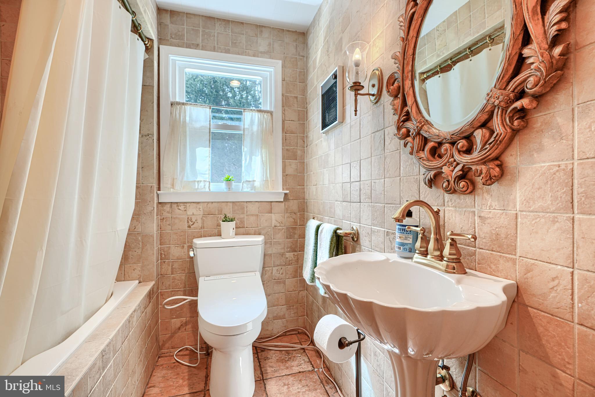 1202 Vermont Road Bel Air, MD 21014 - Photo 20 of 66 a bathroom with a toilet a sink and a mirror