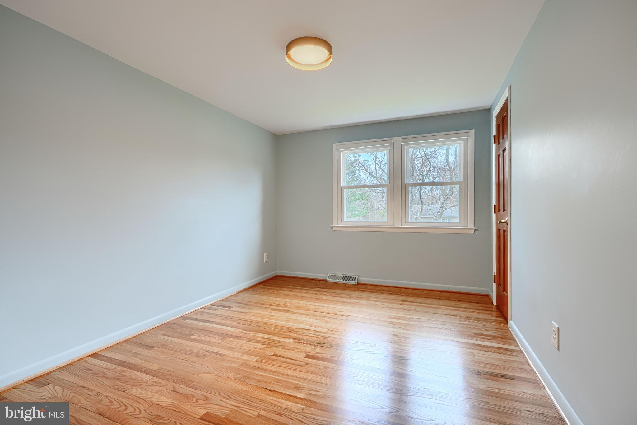 1202 Vermont Road Bel Air, MD 21014 - Photo 36 of 66 wooden floor in an empty room with a window